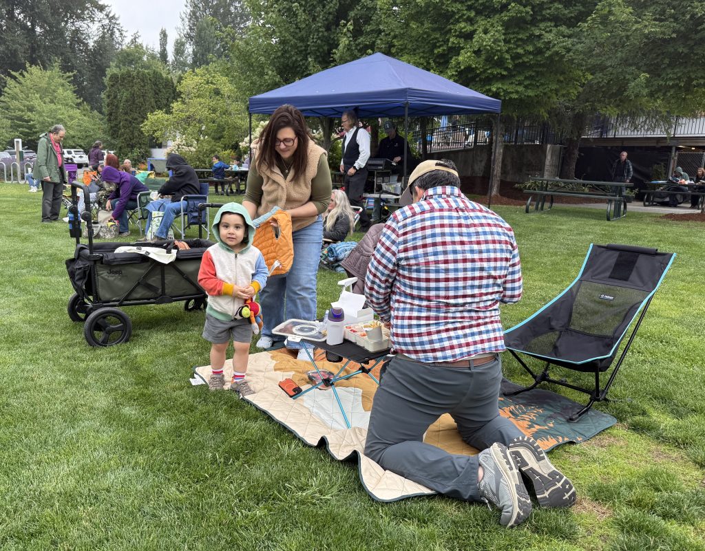 Family setting up before the 7/16/26 performance at Music in the Park