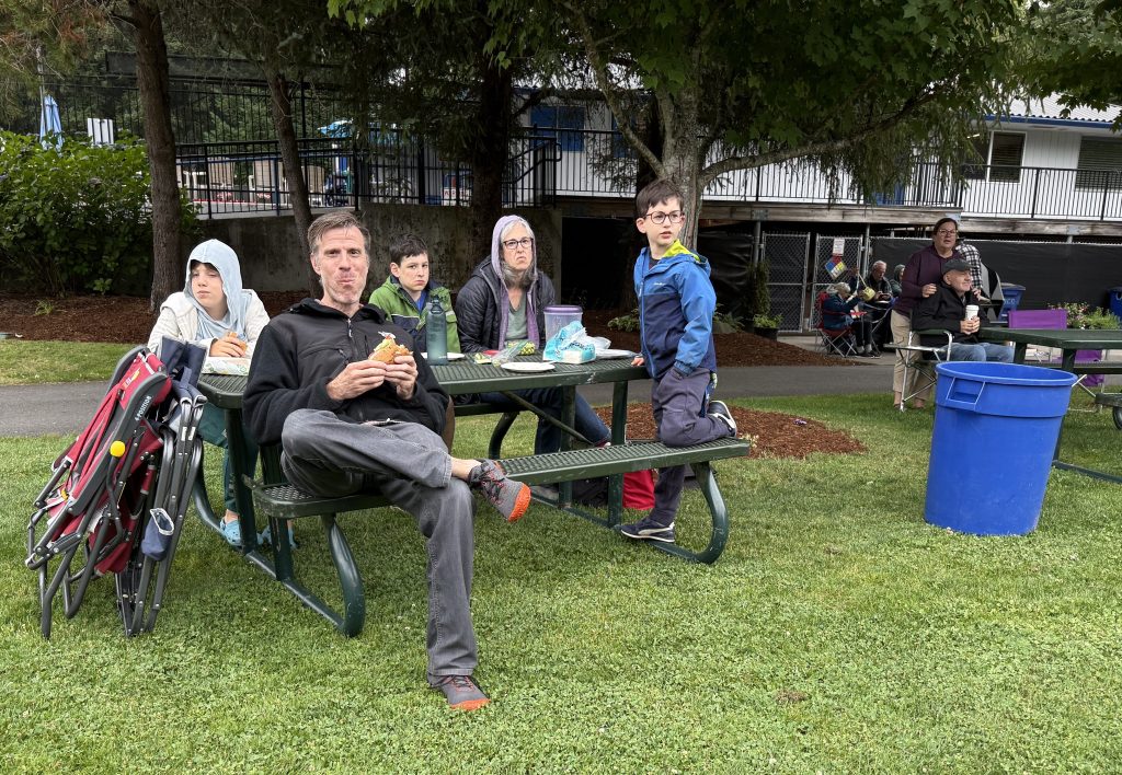 Family having dinner at the 7/16/26 Music in the Park