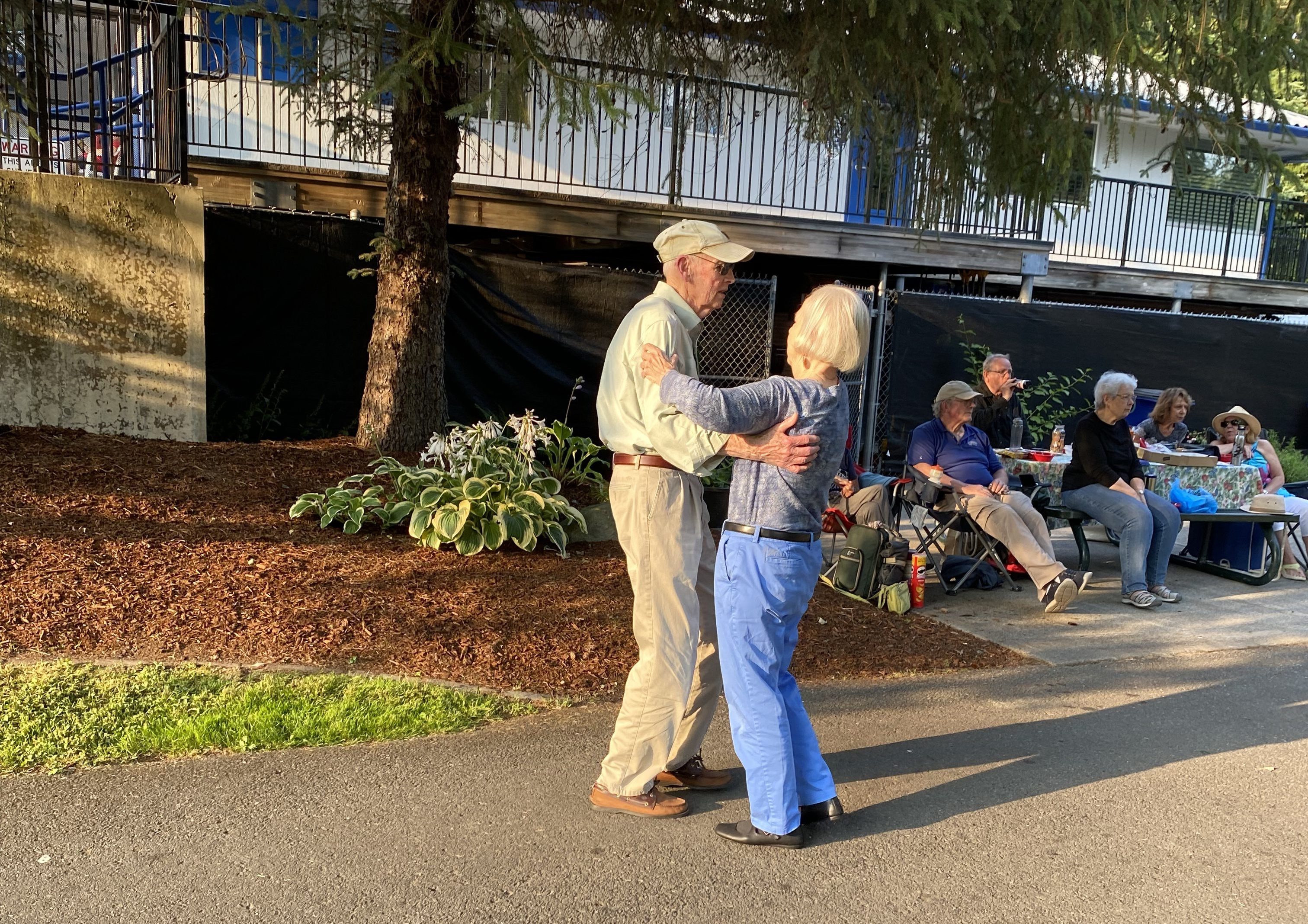 Couple dancing at Cottage Lake Music in the Park July 23, 2026