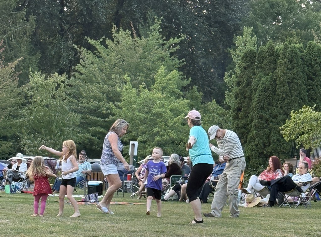8/13/26 Dancing fans at GLOBAL HEAT concert at Music in the Park at Cottage Lake